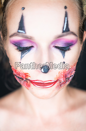 Kvinde med klovn Halloween makeup - Royalty Free Image | PantherMedia Billedbureau